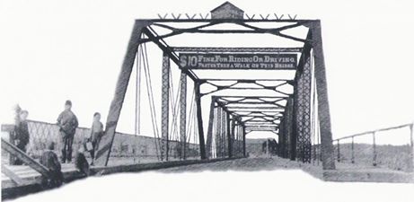 The “Iron Bridge” over the Manistique River stood for nearly 30 years before being replaced by the Siphon Bridge. 