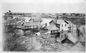 Flooded houses on Weston Avenue,  You can see the houses across the river on North Cedar.  Dated  March 28, 1920.
