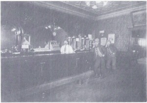 This picture shows the ornate interior of Nels Johnson Saloon. In 1900, he moved from Pearl Street to a new building he had built near the Rose Brothers building. The bar was sold to Emil and Fred Ekberg in 1910. The bar was known as the Ekberg Tavern until 1960, when, under new ownership, it became the Harbor Bar.
