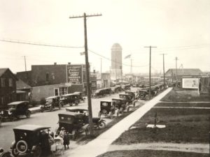 River Street to Watertower dated mid 1920's-in what appears to be the dedication to the monument before the Siphon Bridge. The ever familiar landmark Manistique Water Tower (in the background) was completed in 1922 in which stands 137 feet high.
